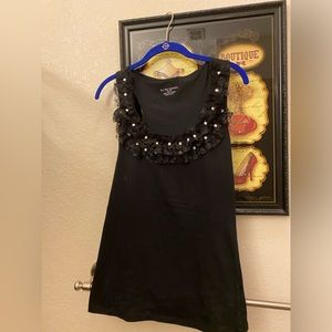 Black racer back tank top with lace and rhinestone neckline. 100% Pima cotton